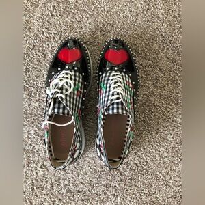 Black and White Checkered Shoes with Red Heart Detail
